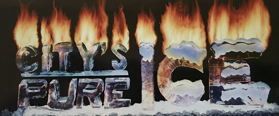 City’s Pure Ice sculpture illuminated with flames